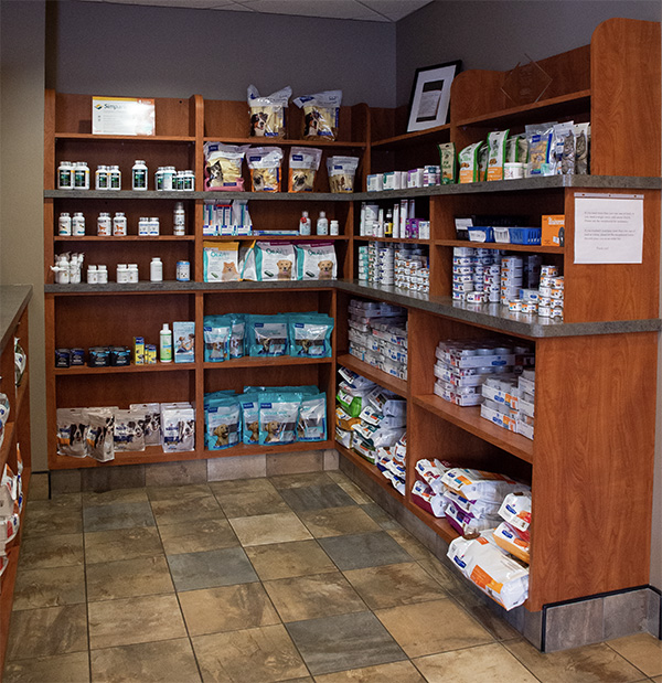 McKean Vet's in house store with shelves of products including food and medicines